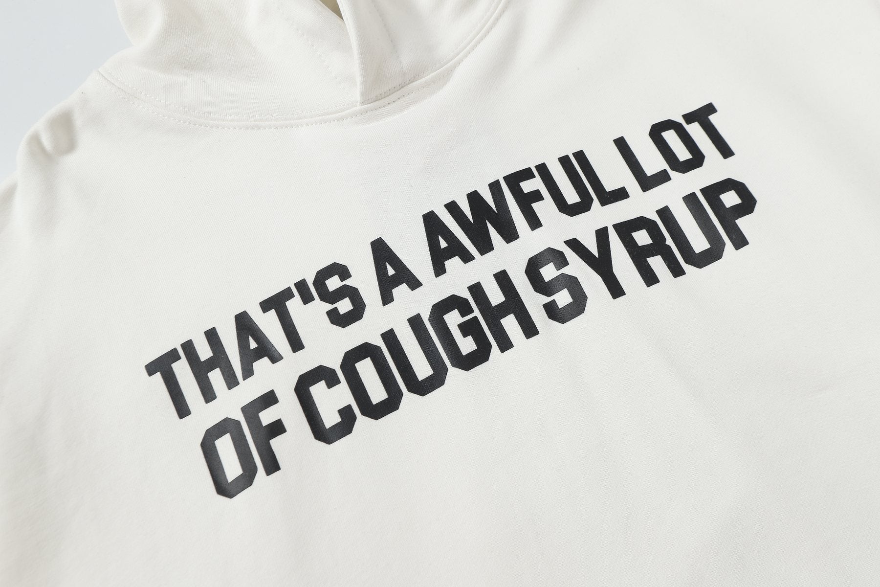 THAT'S A AWFUL LOT OF COUGH SYRUP Angel Tears Graphic Hoodie — detail